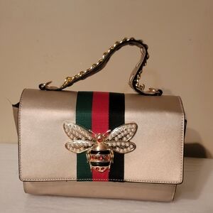 Chic Gold Shoulder Bag with Bee Detail